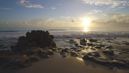 Wall Mural - Anastasia Rock Beach Sunrise Landscape in Slow Motion 4