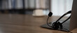 © onephoto - Professional office mood with headset resting on laptop, natural light and negative space for headlines perfect for hotline, customer success, IT support, and training materials.