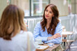 © sepy - Women having coffee outdoors