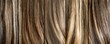 © Yuliia - Straight brown and blonde hair texture background with natural highlights and lowlights showing detailed strands in panoramic close-up view for beauty and haircare concepts.