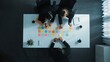 © InfiniteFlow - Top view of professional business team planning marketing strategy. Skilled group of diverse business people writing and sharing creative idea on sticky notes and discuss about plan. Directorate.