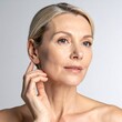 © Rejo - Portrait of a mature woman with blonde hair and soft skin