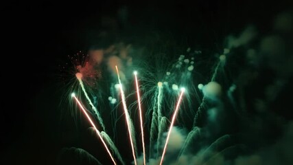 Spectacular red fireworks exploding in night sky perfect for celebrations, holidays, or festive events with dynamic burst and vibrant colors