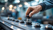 © Kateryna - Vacuum lifter suction cups gripping sheet operator’s sleeve and controls in frame shop defocused material handling ergonomics safety assist fabrication with copy space
