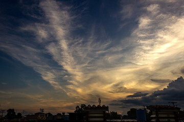 Wall Mural - Sunset in the city with beautiful sky and clouds