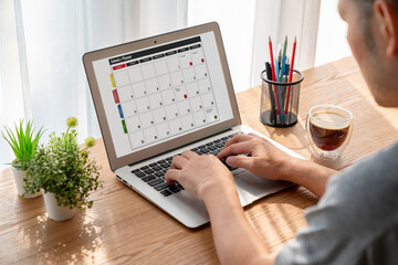 Wall Mural - Calendar on computer software application for modish schedule planning for personal organizer and online business