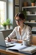 © Bima - A young professional taking notes during an online course in a bright home office with books and a coffee mug