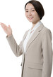 © kapinon - ベージュのスーツを着た立つ若い美人な女性のビジネス上半身のカメラ目線　かわいい白背景の営業などリクルートのイメージ 紹介や案内、こちら	背景透明