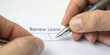 © Naret - Renew lease document with pen in hand showing generation of rent agreement for property management and housing contract renewal process