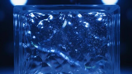Wall Mural - Intricate light patterns refract and distort as they pass through a textured glass block in mesmerizing slow motion spectrum, crystal, intricate light patterns