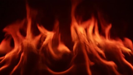 Wall Mural - Seamlessly looping video featuring abstract wavy patterns of deep red and amber flames slowly undulating and transforming power, artistic, burning