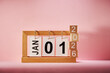 © eskay lim - toy block with number 2026 and calendar with Jan 1
