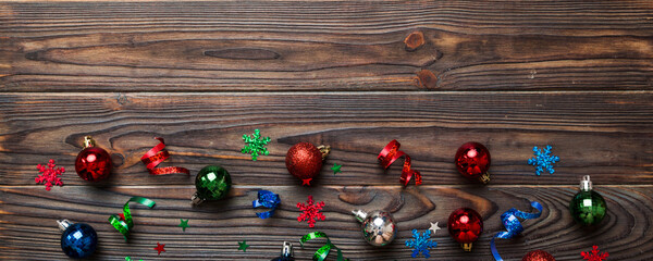 Wall Mural - Christmas composition. a pattern of christmas balls on colored background. Flat lay, top view New year decor