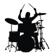 © MAYENUDDIN - Silhouette of a drummer playing a full drum kit with energy