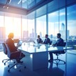 © hasnita - Meeting in a bright, modern office overlooking the city