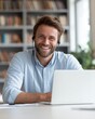 © Bee - Modern Man in Digital Realm: A contemporary man, brimming with happiness, is absorbed in his work, employing a laptop in a modern setting