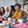 © SolaruS - A diverse group of women smiling and chatting around a table with coffee and crafts. Warm, inviting, and authentic. Ideal for themes of community, friendship, and aging well.
