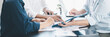 © doidam10 - Panorama of corporate teamwork with people discussing financial reports, pointing at charts, planning business strategy, analyzing data and collaborating in office meeting for professional success.