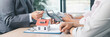 © doidam10 - Panorama of mortgage calculation with house model, key, money, and calculator on desk, representing real estate loan agreement, property investment, financial planning and housing business success.