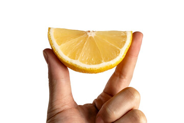 Wall Mural -  hand holding a fresh lemon slice. Isolated on transparent background, png
