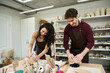 © Bliss - Loving couple creates pottery together in a cozy studio filled with artistic inspiration
