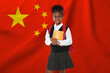 © New Africa - Little girl with backpack and notebooks against flag of China. Language school