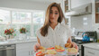 © Monkey Business - Portrait Of Disappointed Woman Holding Spoilt Cupcakes That Have Gone Wrong In Oven