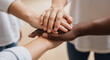 © Vellari - Diverse hands stacked together in teamwork and collaboration
