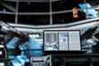 © DC Studio - Close up of laptop in spacecraft displaying mission analytics panel with fuel usage, system load and energy efficiency metrics. Notebook screen showing performance indicators for spacecraft resources