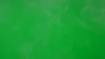 Wall Mural - gentle wisps of smoky particles slowly rise and dissipate, creating an ethereal abstract effect on a