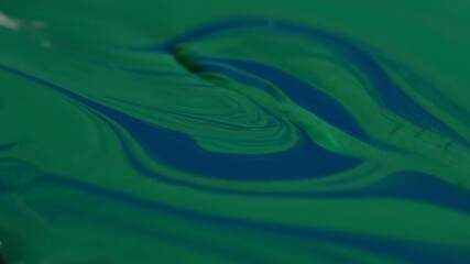 Wall Mural - serpentine patterns of flowing liquid in natural greens and blues, forming a mesmerizing, seamlessly