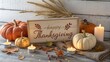 ©  SABBIR  - Cozy thanksgiving scene with pumpkins, candles, and a happy thanksgiving sign