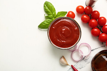 Wall Mural - Bowl of tasty tomato sauce and different ingredients on white background