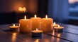 © Endang - Several lit candles on a wooden table, warm ambiance