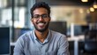 © Sirichat. Camphol - Engaging business professional smiling in modern office setting indoor portrait inspiring atmosphere close-up perspective for networking success