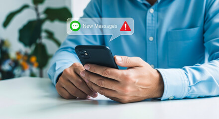 Person holding smartphone with new messages notification and alert icon mobile
