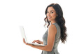 © PNG Stock - Young woman smiling working on laptop computer with black background professional office setting isolated on transparent background