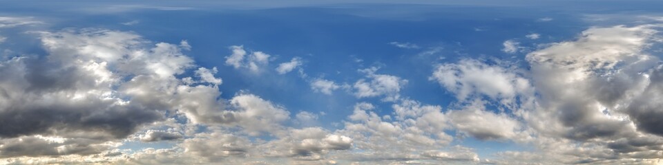 Wall Mural - 360 hdri blue sky with beautiful clouds like a seamless panorama view with zenith for use in 3d graphics or game development as sky dome or edit drone shot