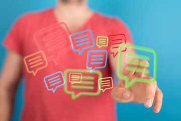 Concept of digital communication with speech bubbles representing online interaction, message exchange, social media, network connection.