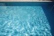 © juliars - Sunlight creates beautiful patterns on the bottom of a swimming pool with clear, rippling water