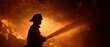 © nira - Brave silhouette: firefighter combating intense flames with high-pressure water hose