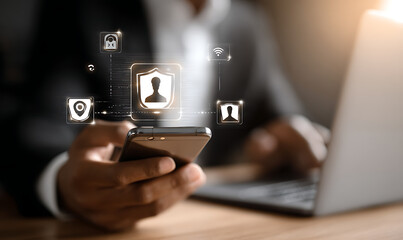 Businessman using his smartphone to set up a security feature on a white background