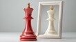 © Nataliia_Trushchenko - Two chess pieces, one red and one white, are placed in front of a mirror. The red piece is a king, and the white piece is a pawn. Concept of strategy and competition