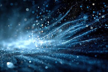 Wall Mural - Beautiful abstract swirls of blue light and sparkles create a magical atmosphere in a dark setting
