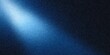© malshak_off - Blue spotlight creating light beam on dark abstract background with noise texture and grain effect
