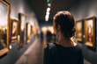 © EricMiguel - Young woman admiring framed paintings in a dimly lit museum gallery, a thoughtful visitor exploring art and culture under warm spotlights