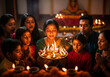 © Stockphotosbysumit - Celebrating diwali: Diwali puja: Indian family performing traditional Diwali puja and aarti ceremony at home.