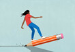 © fStop - Teenage girl balancing on top of large pencil drawing line on blue background