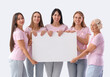 © Pixel-Shot - Group of beautiful women with pink awareness ribbons and blank poster on white background. Breast cancer concept