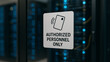 © AiDesign - Authorized personnel only sign on glass door of server room restricted access security rule monitoring enforcement workplace protection and technology environment